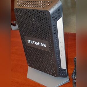 Netgear CM1000 ultra-high speed cable modem. Needs repair.